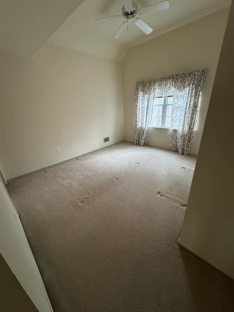 After photo of a completely empty bedroom following a full mattress and bed removal service by JunkDoctors in NJ.