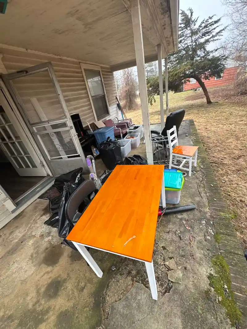 A Newark, New Jersey foreclosure property filled with left-behind belongings before JunkDoctors completed a trash-out cleanout.