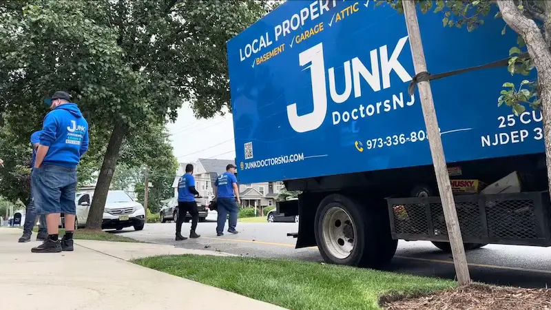 Junk Doctors NJ professional team and 25-cubic-yard truck arriving for an eco-friendly refrigerator removal and appliance recycling job.